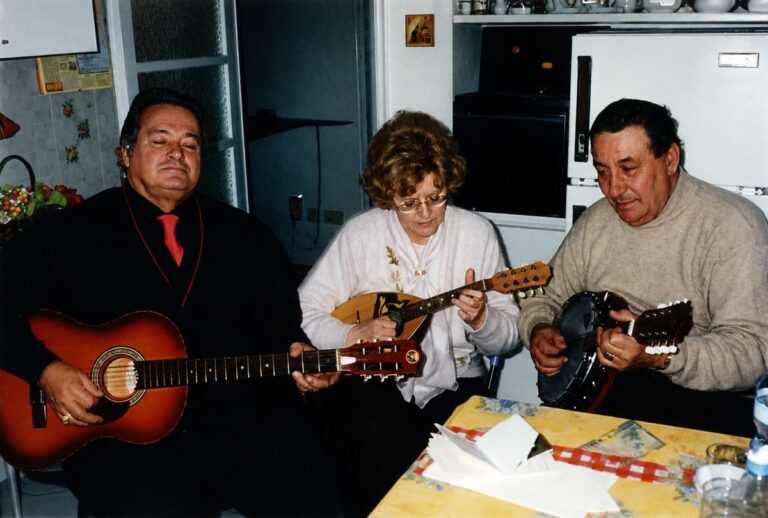 Adriana playing music with friends and mandolin