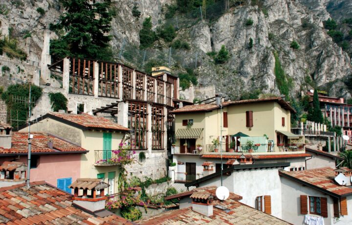 Centuries-old stone pillar lemon house and terraced olive groves overlooking Lake Garda