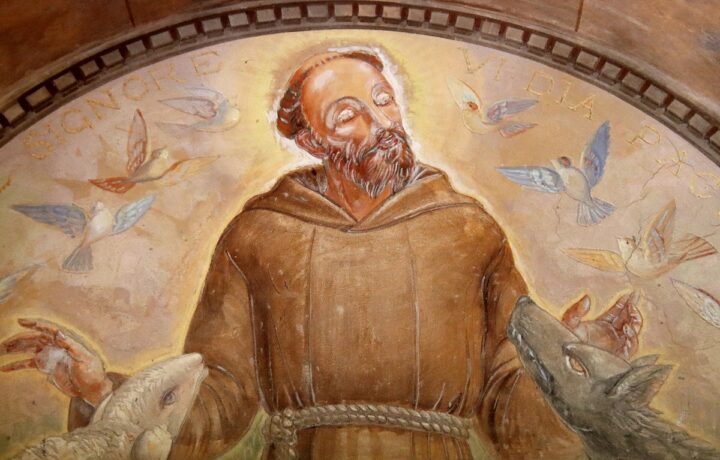 Fresco in the Capuchin Convent of Barbarano depicting Saint Francis with the wolf and the lamb inscribed Signore vi dia pace