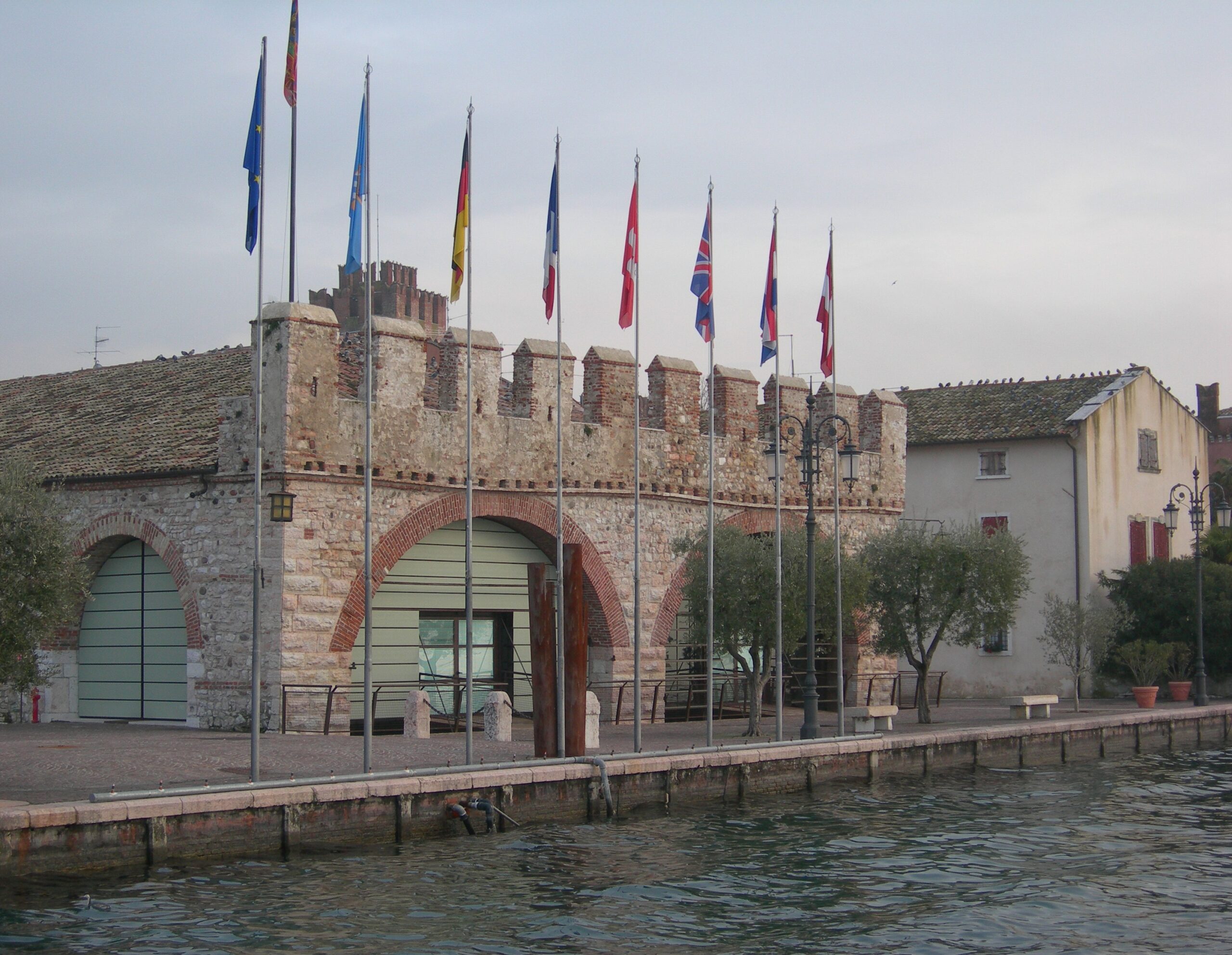 Historic fourteenth-century Dogana Veneta on the lakeshore harbour of Lazise