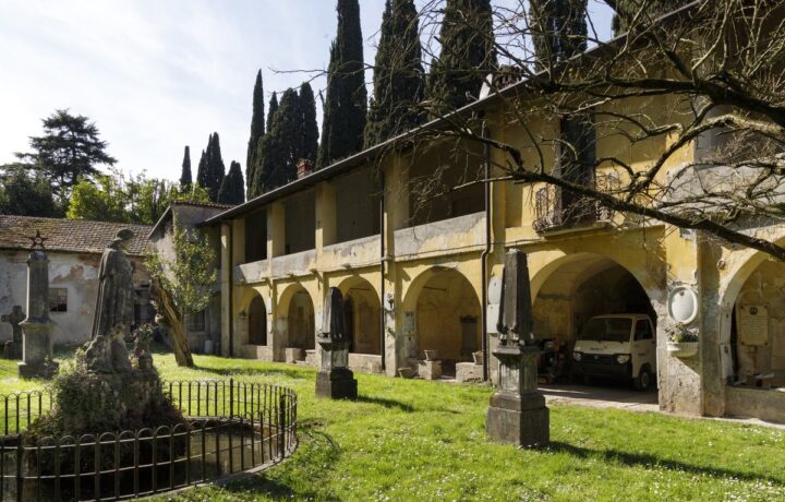 The historic portico and courtyard of the ancient Lazzaretto facing Lake Garda in Salò