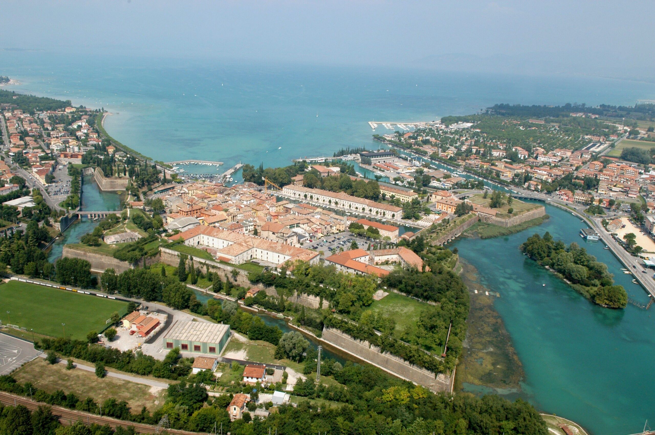 Aerial panorama of Peschiera del Garda historical fortress and lake outlet canals