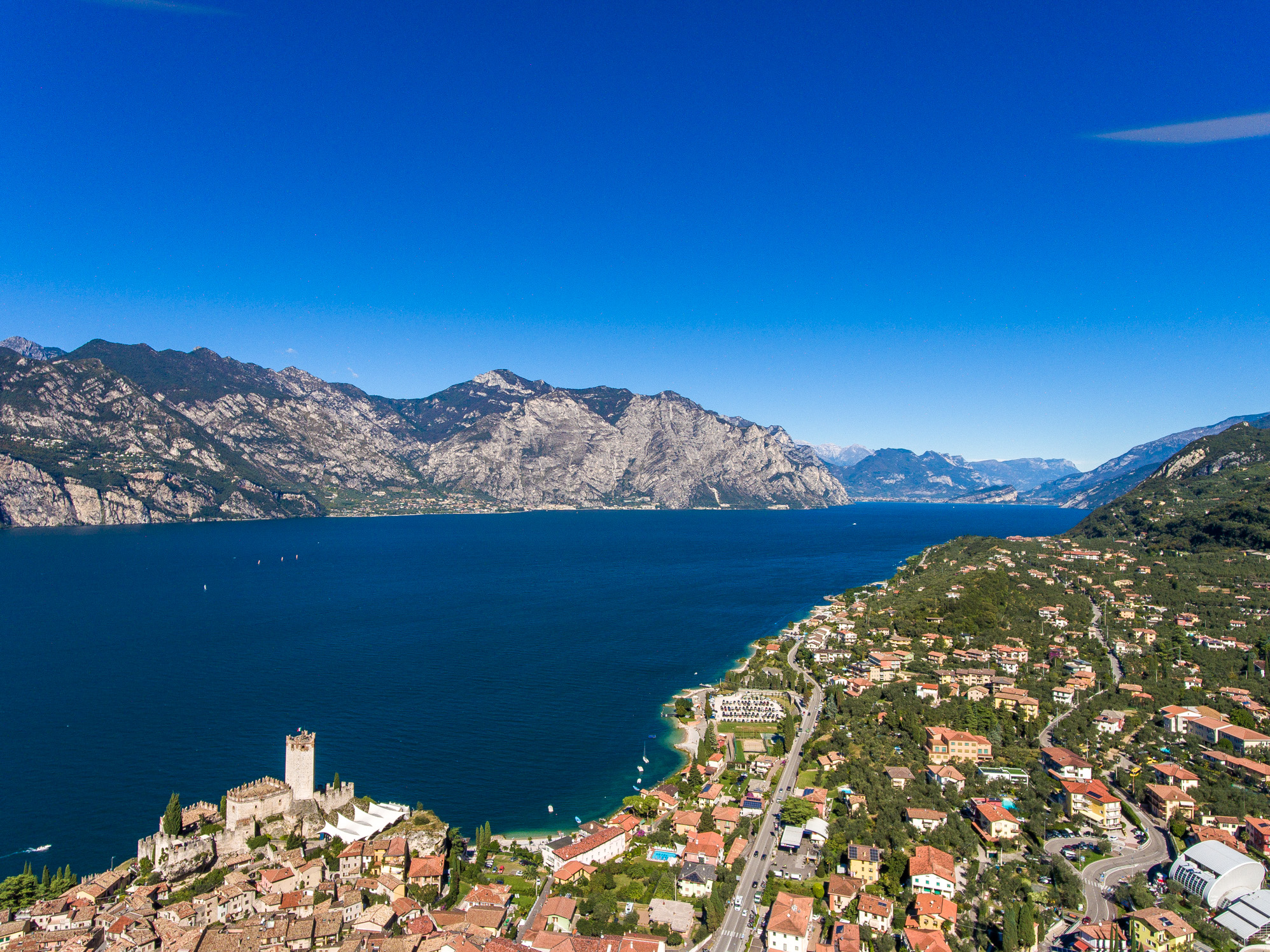 Aerial view of Tignale plateau and sheer dolomite cliffs above Lake Garda